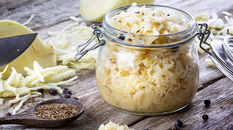 Jar of sauerkraut with rye seeds