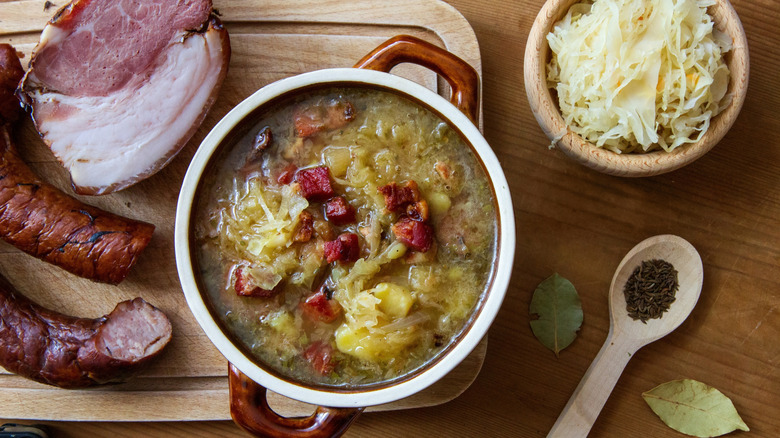 Sauerkraut soup with bacon and sausage