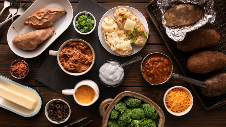 The fixings for a baked potato bar