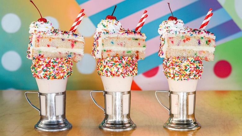 Three CrazyShake milkshakes at Black Tap Craft Burgers & Beer