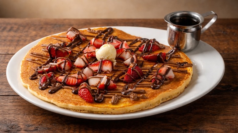 A pancake with strawberries and chocolate at Hash House a Go Go