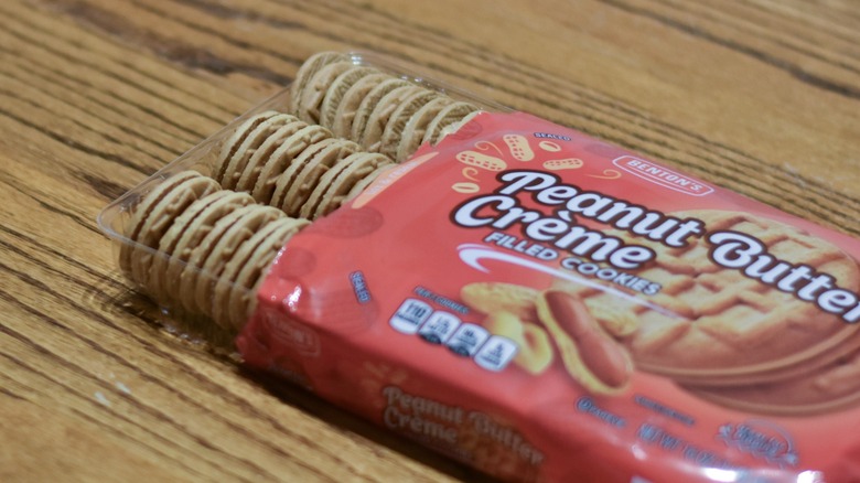 A package of peanut butter creme filled cookies on a wooden table
