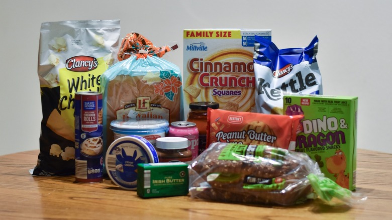 A collection of Aldi store-brand products on a wooden table