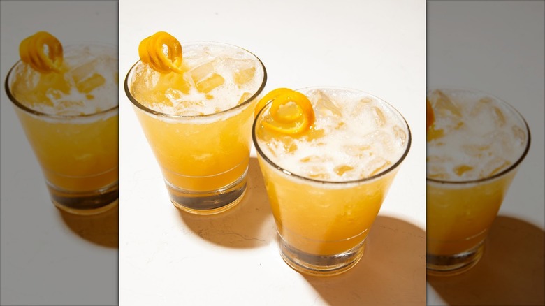 Two Bourbon Peach Smash cocktails at California Pizza Kitchen