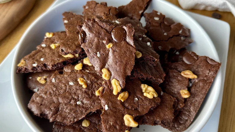 Chocolate brownie brittle served in a white bowl