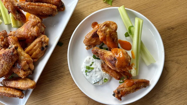 Buffalo wings served with celery and blue cheese dip