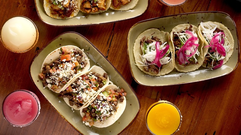Plates of nachos and drinks at Miracle Mile Shops