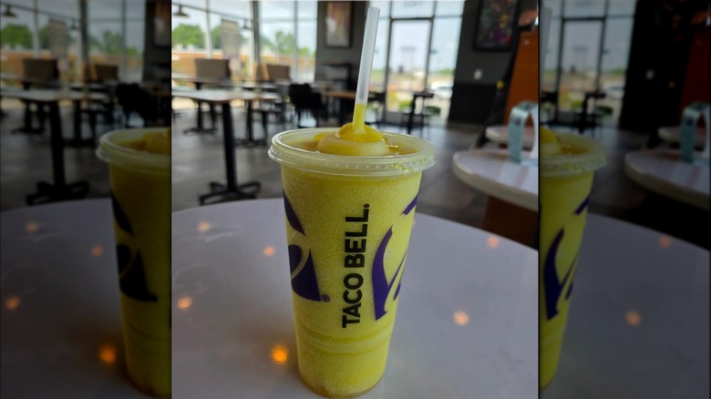 Cup of Taco Bell Pineapple Citrus Energy Freeze on table