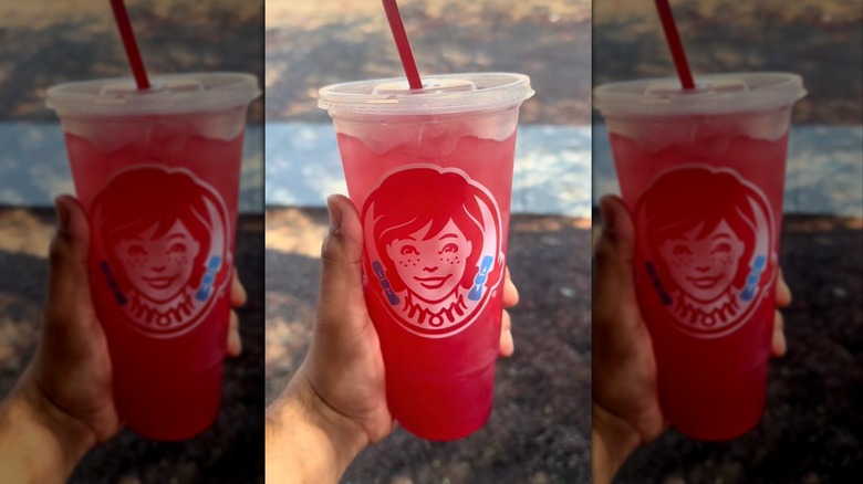 Hand holding Wendy's Watermelon Lemonade