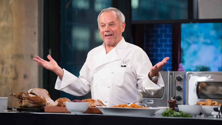 Wolfgang Puck talking on a cooking show