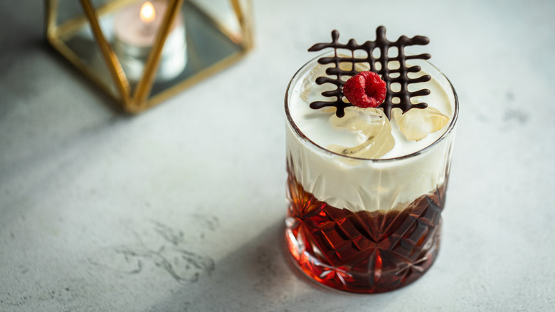 Cocktail with chocolate garnish in it