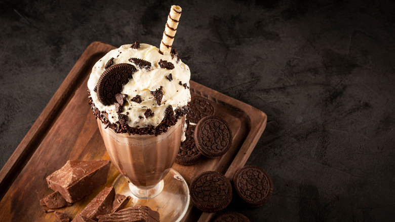 Boozy chocolate milkshake with cookie garnishes