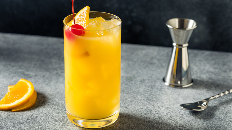 Glass of Harvey Wallbanger cocktail with garnish