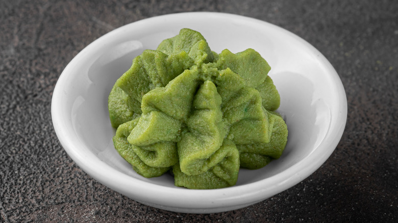 small white bowl with wasabi sauce