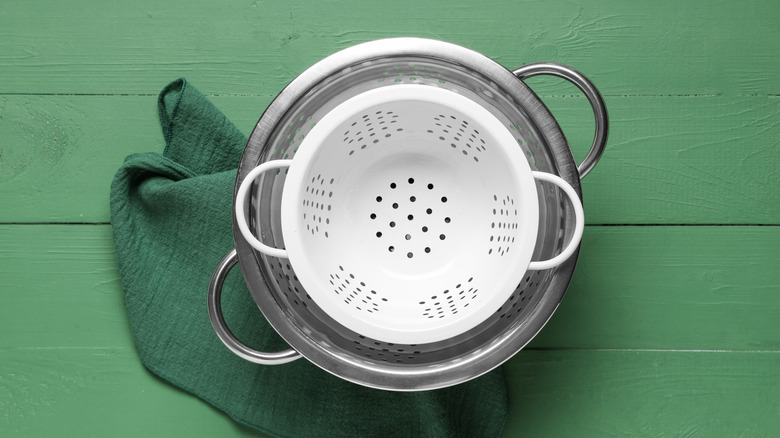 Plastic and stainless steel colanders