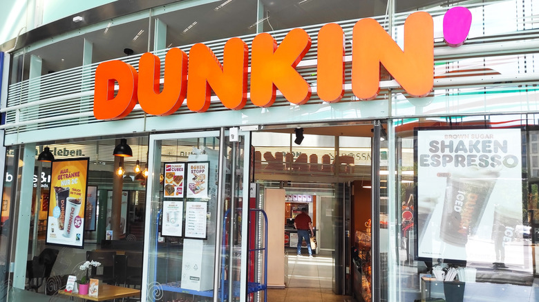 The Dunkin' sign outside one of its locations