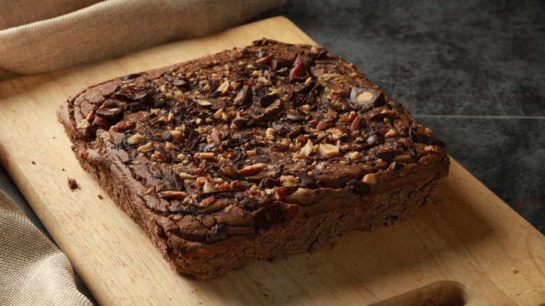 Tray of black bean brownies on a cutting board