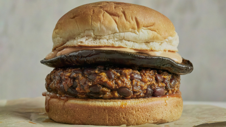 Vegan black bean burger with grilled eggplant