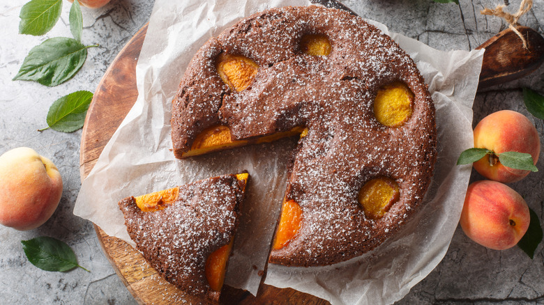 a chocolate cake with peaches inside