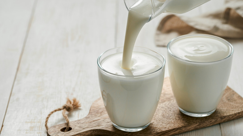 pouring buttermilk into glass