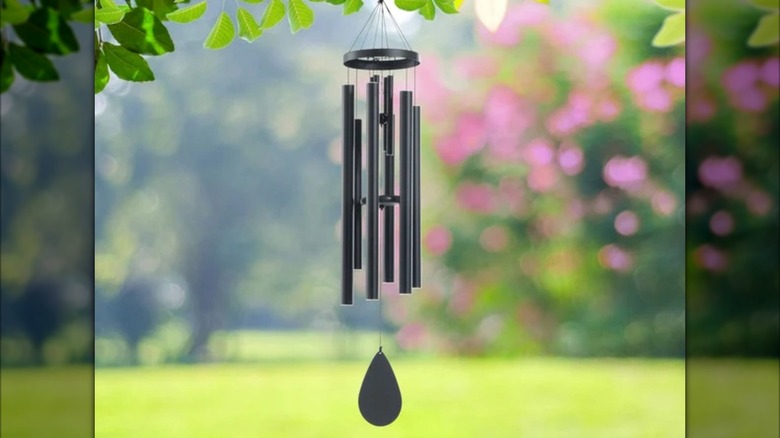 A wind chime hanging from a tree