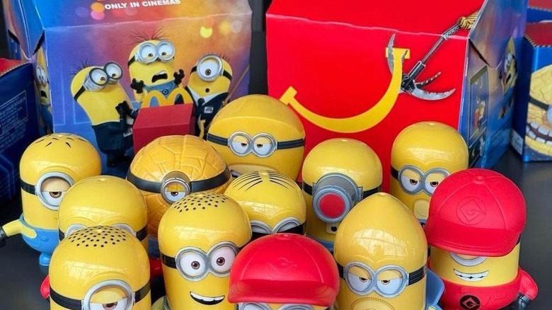 Two Happy Meals with an assortment of toys in front