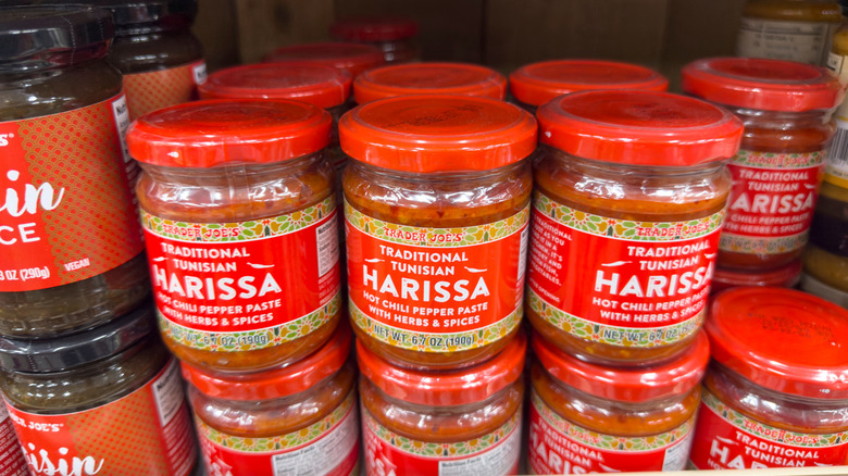 Jars of Tunisian harissa pasta stacked on top of each other