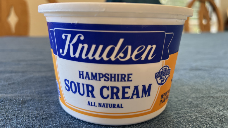 A tub of Knudsen brand sour cream