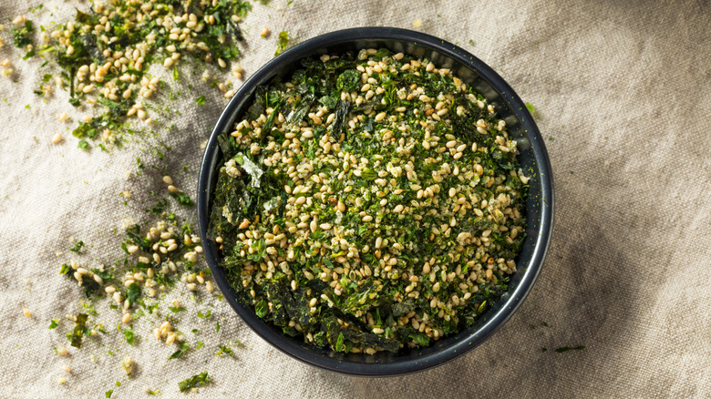 Bowl of furikake on a gray cloth
