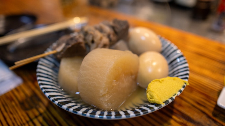 A plate of oden with Japanese mustard paste on the side