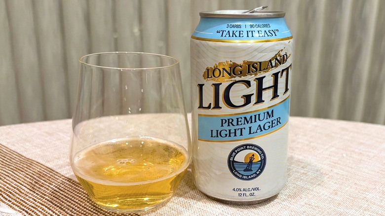 A glass of Long Island Light next to its can