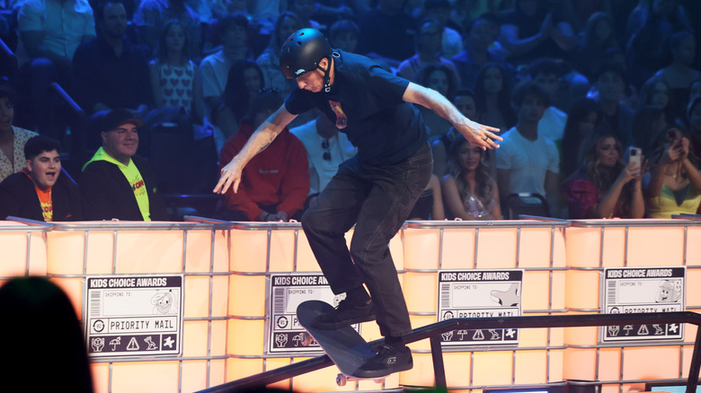 Tony Hawk performs tricks on his skateboard