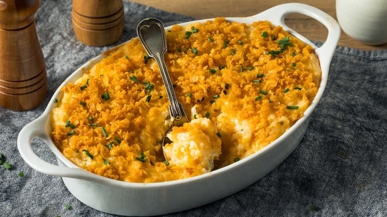 A dish of funeral potatoes on a table