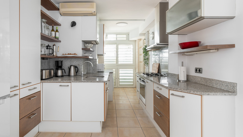 Kitchen with separate counters for sink and stove