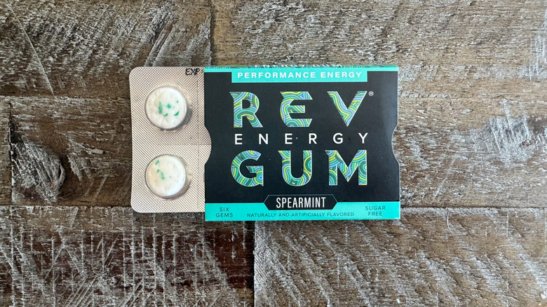 Rev Energy gum packet on wooden surface