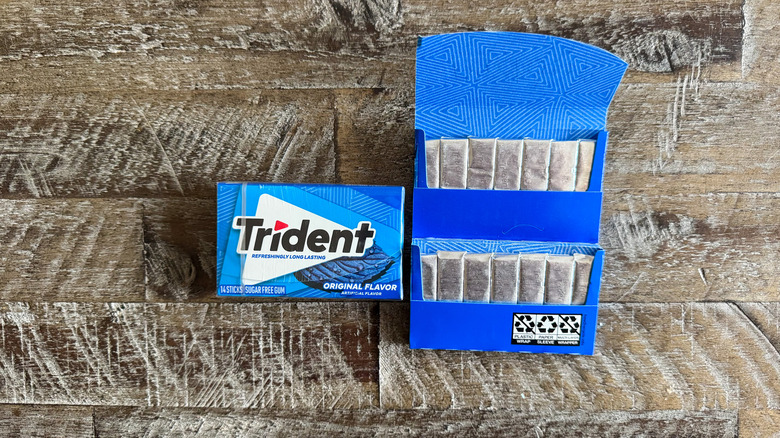Trident chewing gum on wooden surface