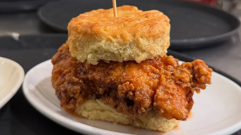 Fried chicken biscuit topped with toothpick