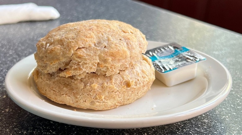Multigrain biscuit on a white plate