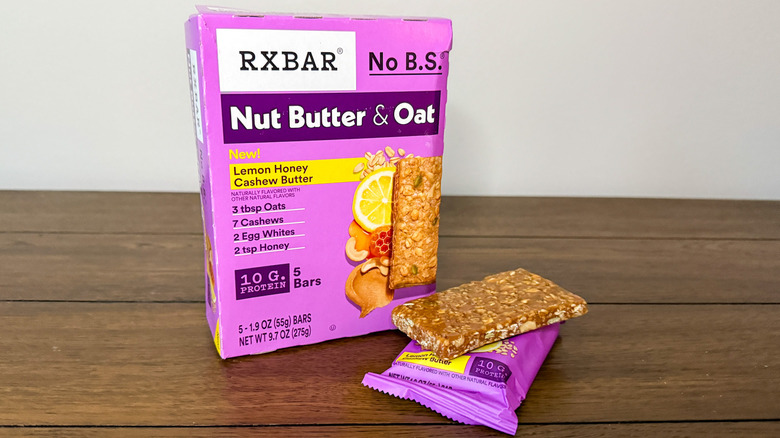 Pink box of Nut Butter & Oat Lemon Honey Cashew Butter RXBARs