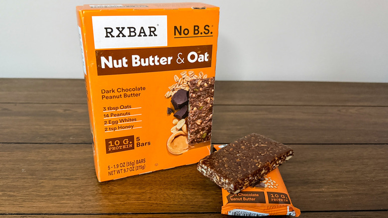 Orange box of Nut Butter & Oat Dark Chocolate Peanut Butter RXBARs