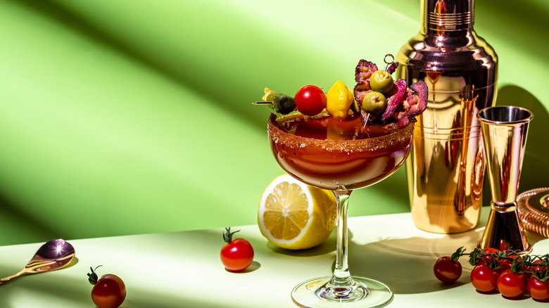 Bloody Mary with collection of savory garnishes