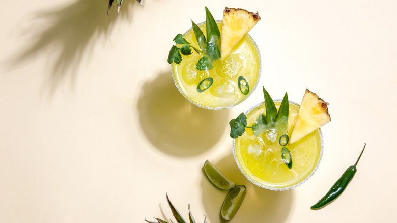 Overhead view of pineapple jalapeno margaritas