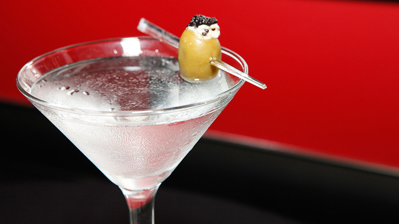 Martini with blue cheese and caviar stuffed olive