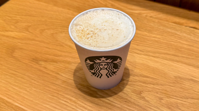 Hot Pecan Crunch Latte on a table