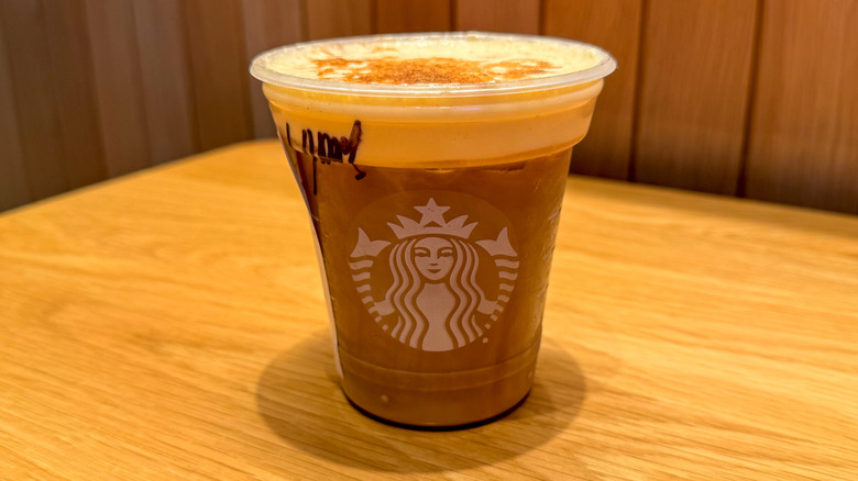 Pumpkin cold brew in a cup