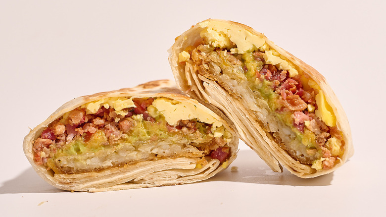 California Crunchwrap cut in half on a white table