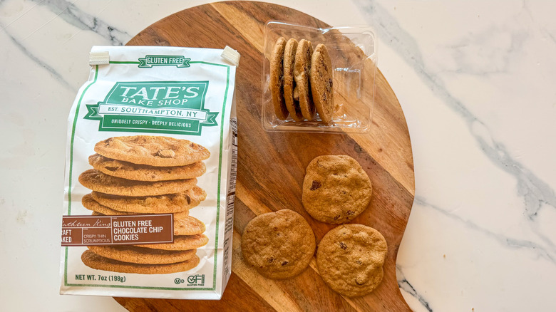 Tate's Gluten Free Chocolate Chip Cookies on round, wooden cutting board