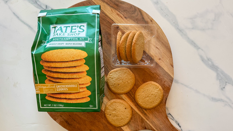 Tate's Snickerdoodle Cookies on round, wooden cutting board