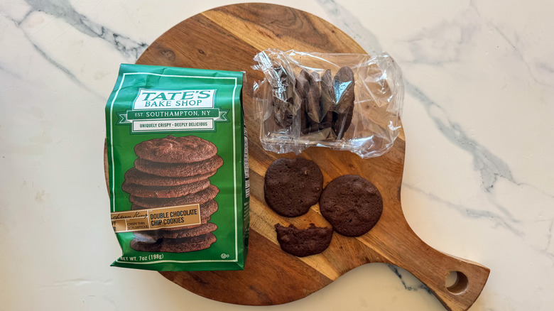 Tate's Double Chocolate Chip Cookies on round, wooden cutting board