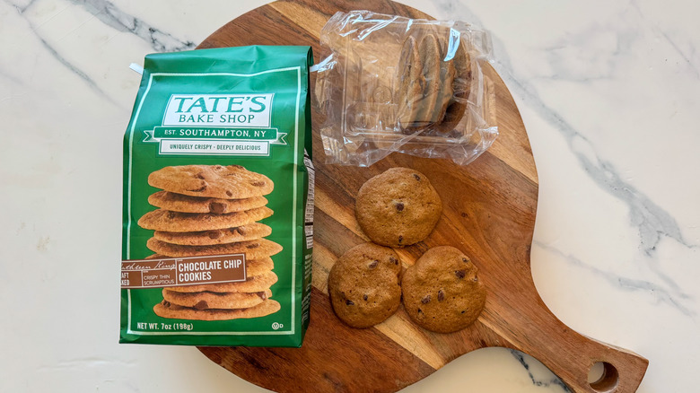 Tate's Chocolate Chip Cookies on round, wooden cutting board